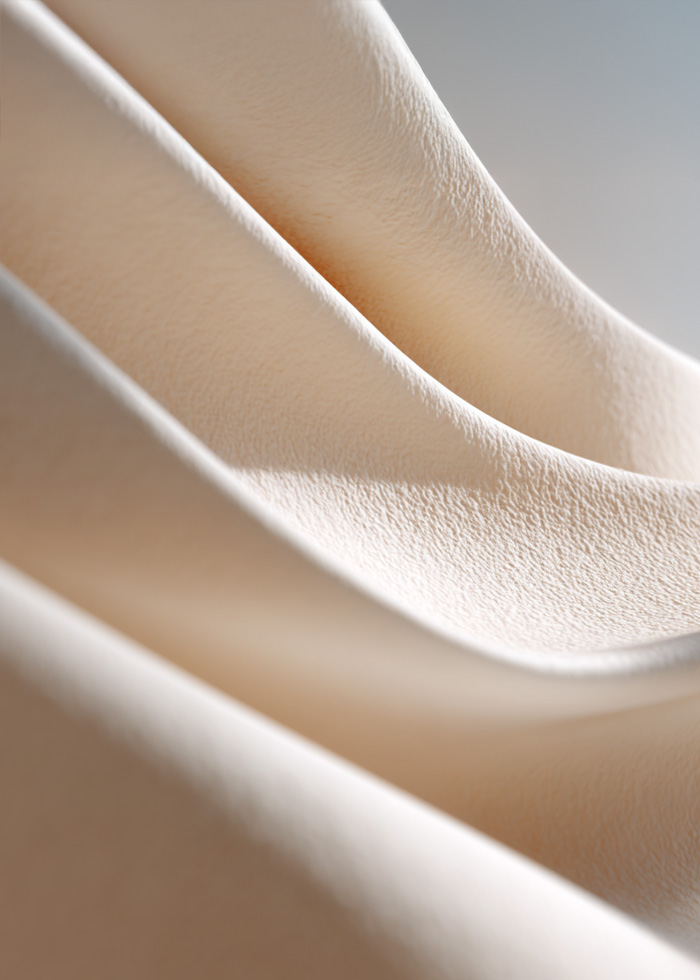 Close-up texture detail representing skin quality and surface refinement in body treatments.