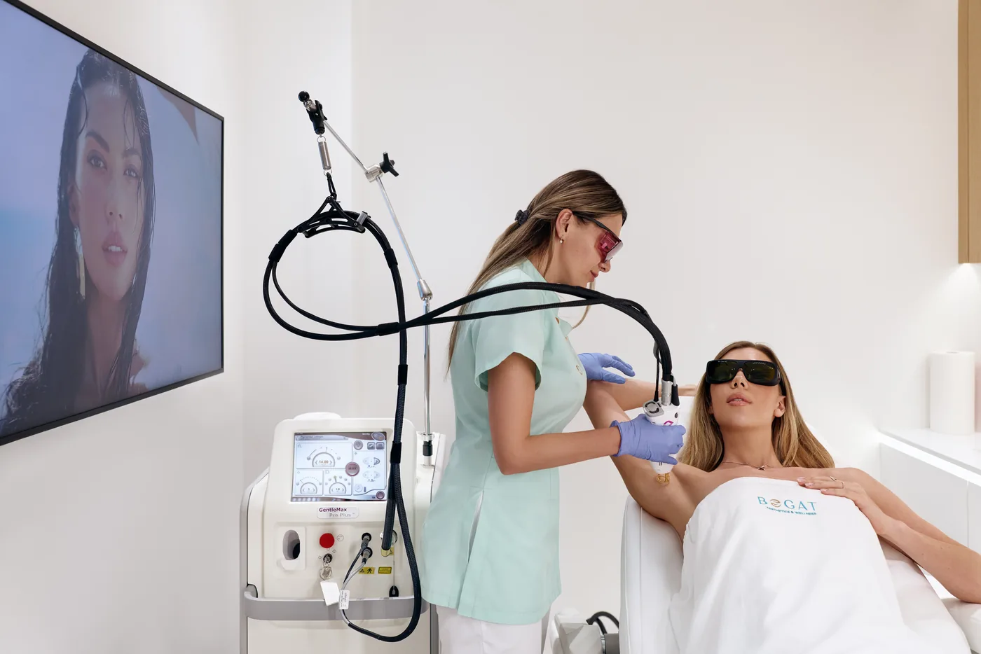 The Candela GentleMax Pro Plus laser and treatment room during a session at Bogat Aesthetics & Wellness in Hallandale Beach, FL.